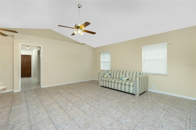 interior space with ceiling fan and lofted ceiling