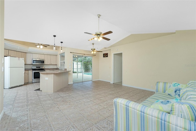 kitchen featuring lofted ceiling, appliances with stainless steel finishes, ceiling fan, and kitchen peninsula