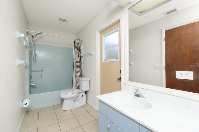 full bathroom featuring vanity, a textured ceiling, shower / bathtub combination with curtain, toilet, and tile patterned floors