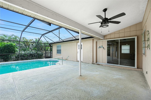 view of swimming pool with a lanai and a patio area