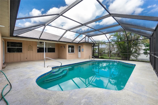 view of pool featuring a patio area and a lanai