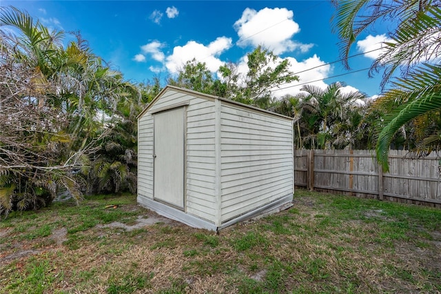 view of outdoor structure with a lawn