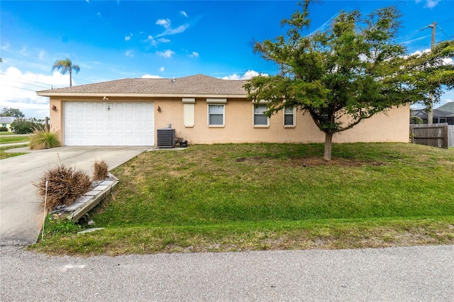 ranch-style house with a garage, central air condition unit, and a front lawn