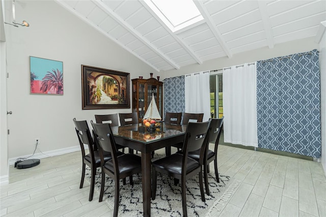 dining space with light hardwood / wood-style flooring, wooden ceiling, and lofted ceiling with beams