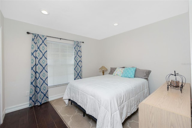 bedroom featuring dark wood-type flooring