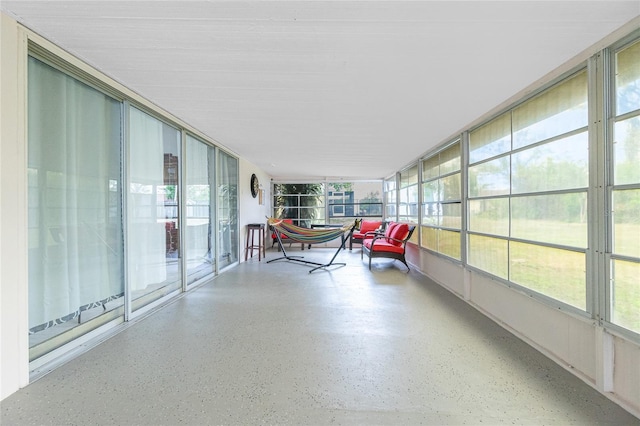 unfurnished sunroom featuring a healthy amount of sunlight