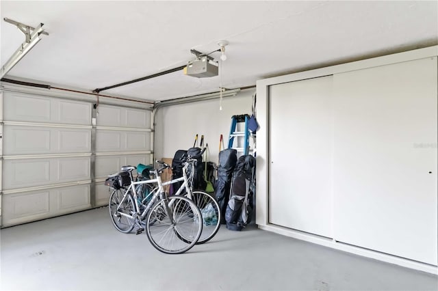 garage featuring a garage door opener