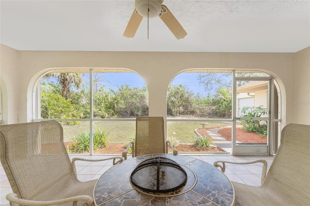 sunroom / solarium featuring a healthy amount of sunlight