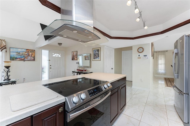 kitchen featuring marble finish floor, island exhaust hood, appliances with stainless steel finishes, and light countertops