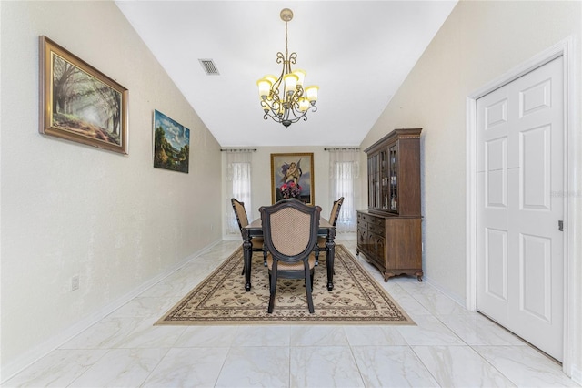 dining area featuring lofted ceiling, marble finish floor, visible vents, and a notable chandelier