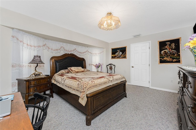 bedroom featuring a textured ceiling, a chandelier, light colored carpet, visible vents, and baseboards