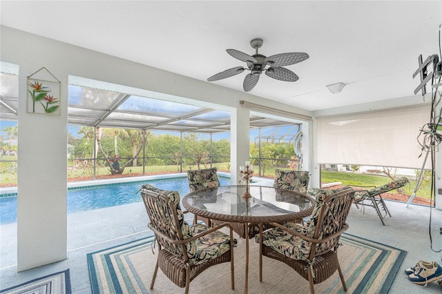 interior space with ceiling fan