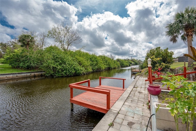 view of dock with a water view