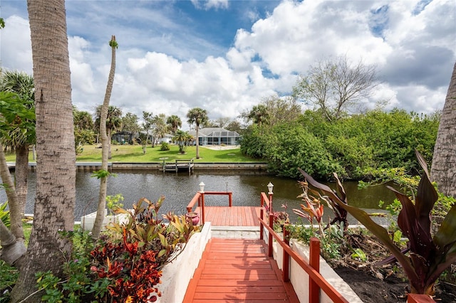 dock area with a water view