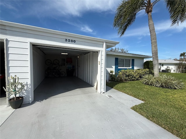 garage featuring a yard