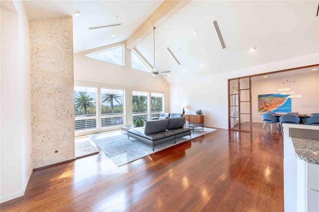 living room featuring high vaulted ceiling, ceiling fan, dark wood-type flooring, beam ceiling, and french doors