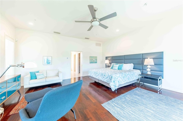 bedroom with dark wood-type flooring and ceiling fan