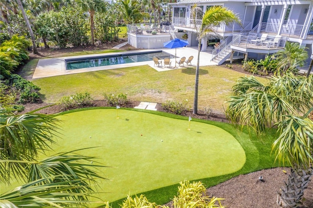 exterior space with a patio and a yard