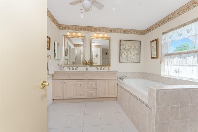 full bath with double vanity, tile patterned flooring, a sink, and a bath