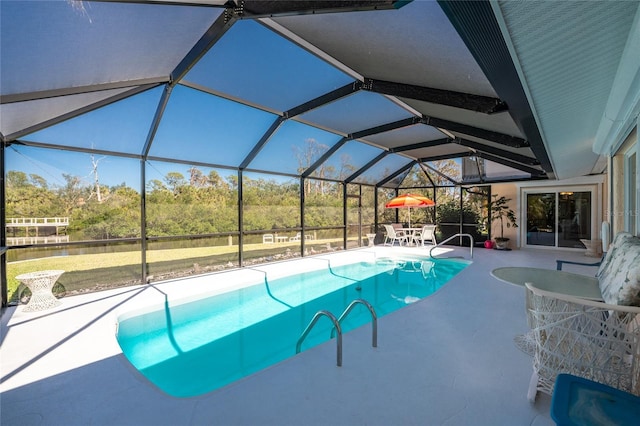 pool with a patio and a lanai