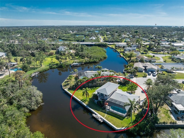 bird's eye view featuring a residential view and a water view