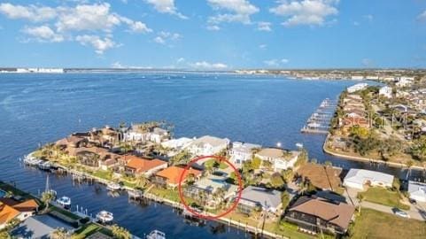 aerial view featuring a water view and a residential view