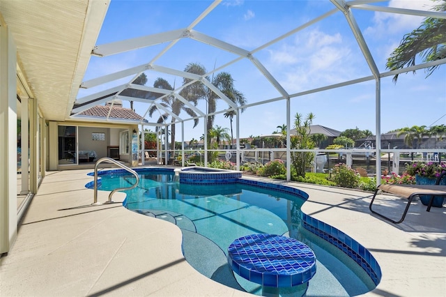2160 Palm Tree Dr, Punta Gorda, FL 33950 - view of swimming pool with a patio, a pool with connected hot tub, and glass enclosure