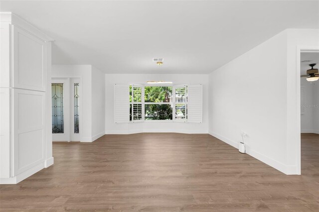 2160 Palm Tree Dr, Punta Gorda, FL 33950 - empty room with light wood-style floors