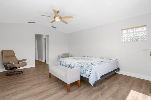 2160 Palm Tree Dr, Punta Gorda, FL 33950 - bedroom featuring vaulted ceiling, wood finished floors, and a ceiling fan