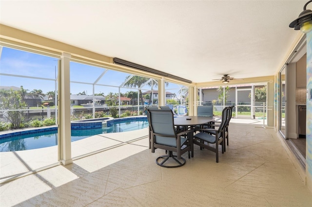 2160 Palm Tree Dr, Punta Gorda, FL 33950 - sunroom / solarium featuring a ceiling fan, a jacuzzi, a swimming pool, and outdoor dining area