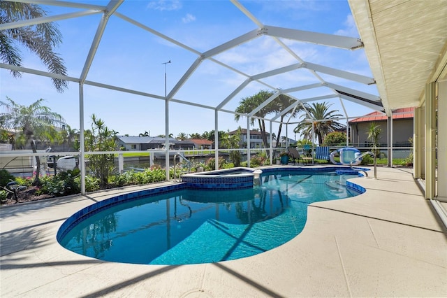 2160 Palm Tree Dr, Punta Gorda, FL 33950 - view of swimming pool with a pool with connected hot tub, a patio area, and glass enclosure