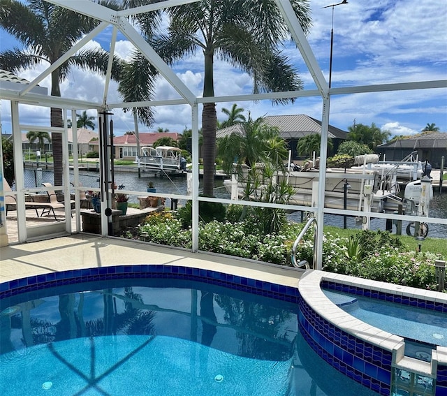 2160 Palm Tree Dr, Punta Gorda, FL 33950 - view of swimming pool featuring a lanai, a water view, a boat dock, boat lift, and a patio area