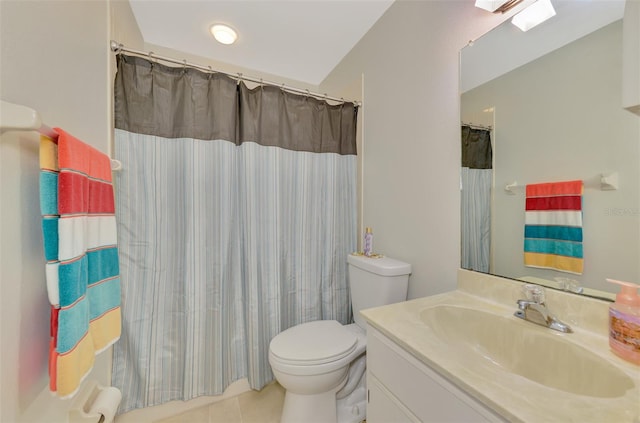 bathroom featuring toilet, tile patterned floors, a shower with shower curtain, and vanity