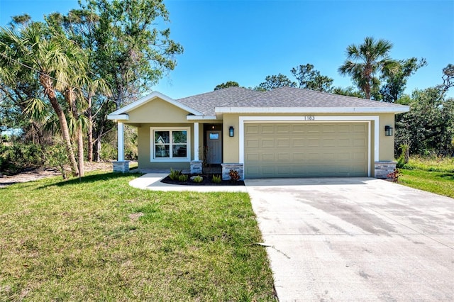 view of front of house with roof with shingles, stucco siding, a garage, driveway, and a front lawn