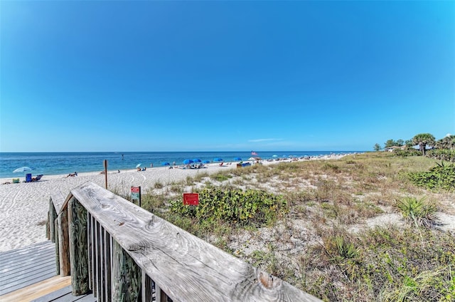 view of water feature with a beach view