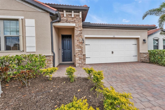 view of front of property with a garage