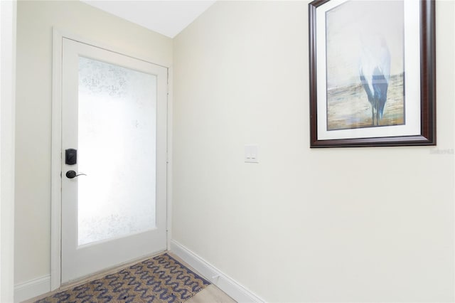 2255 N Beach Rd Unit 13, Englewood, FL 34223 - doorway to outside with baseboards