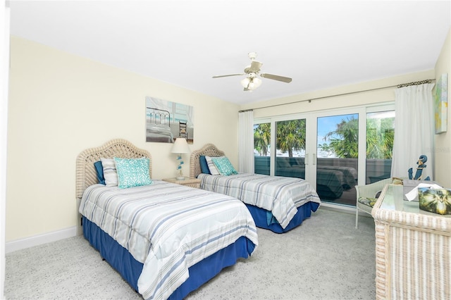 2255 N Beach Rd Unit 13, Englewood, FL 34223 - bedroom featuring access to exterior, baseboards, and a ceiling fan
