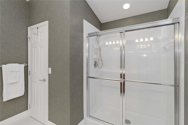 full bathroom with a stall shower