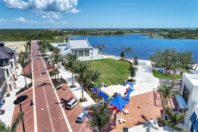 birds eye view of property featuring a water view