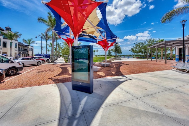 view of community featuring uncovered parking