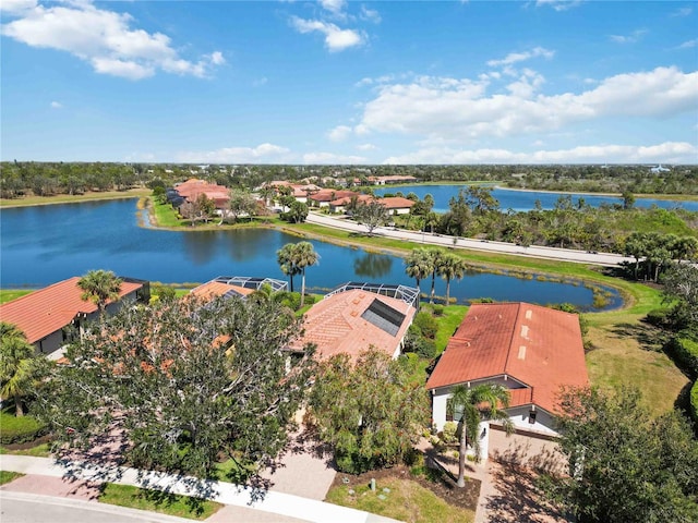 drone / aerial view with a water view