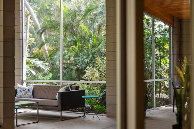 doorway to outside with expansive windows