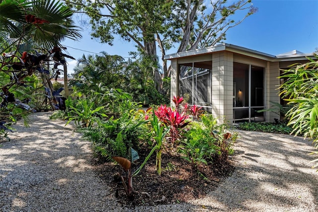 exterior space with a sunroom