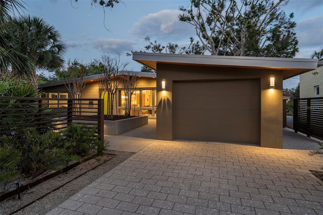 view of front of property featuring a garage