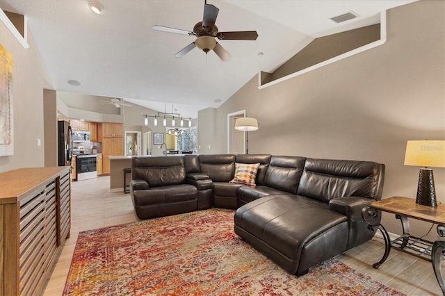 4050 Rock Creek Dr, Port Charlotte, FL 33948 - living area with vaulted ceiling, ceiling fan, and visible vents
