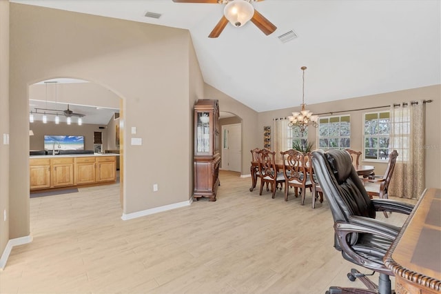 4050 Rock Creek Dr, Port Charlotte, FL 33948 - office space with light wood-type flooring, visible vents, arched walkways, and ceiling fan with notable chandelier