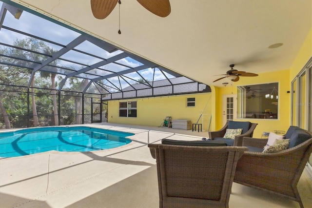 4050 Rock Creek Dr, Port Charlotte, FL 33948 - outdoor pool with a patio area, glass enclosure, an outdoor living space, and a ceiling fan