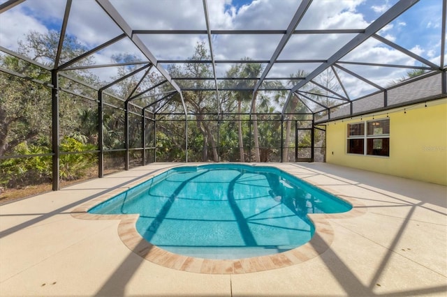 4050 Rock Creek Dr, Port Charlotte, FL 33948 - pool with glass enclosure and a patio area