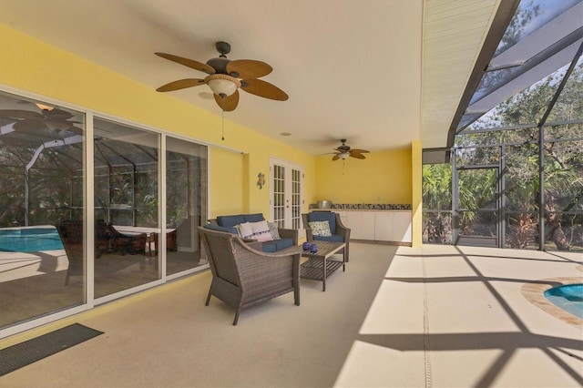 4050 Rock Creek Dr, Port Charlotte, FL 33948 - view of patio / terrace with an outdoor hangout area, glass enclosure, french doors, and an outdoor pool